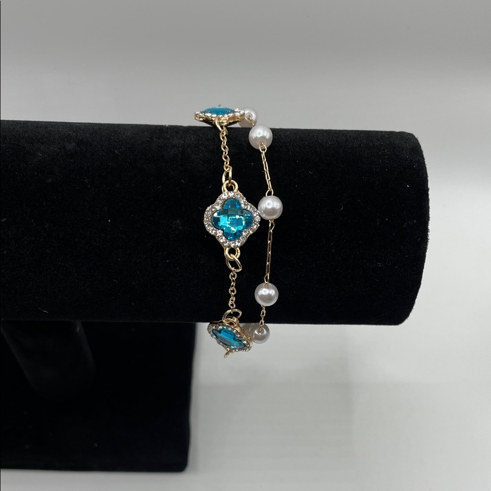 Elegant Gold and Blue Bracelet with Pearls